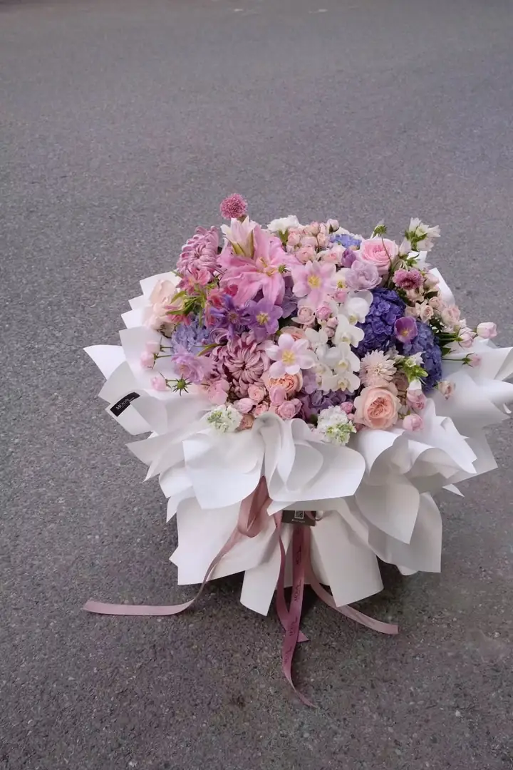 Bó hoa mix tím hồng pastel
